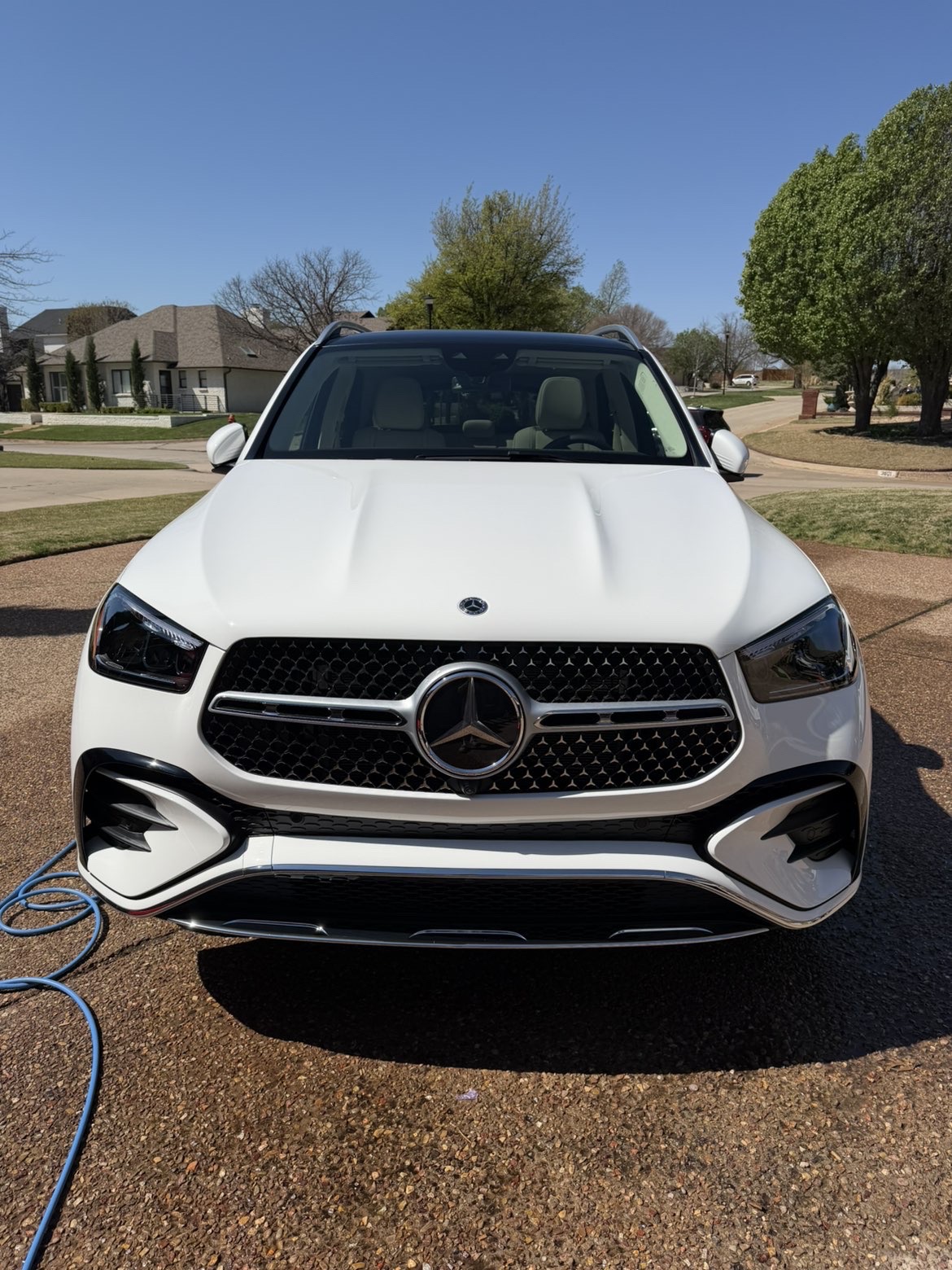 White Mercedes-Benz GLE 350 front view after mobile detail by JBG Auto Spa