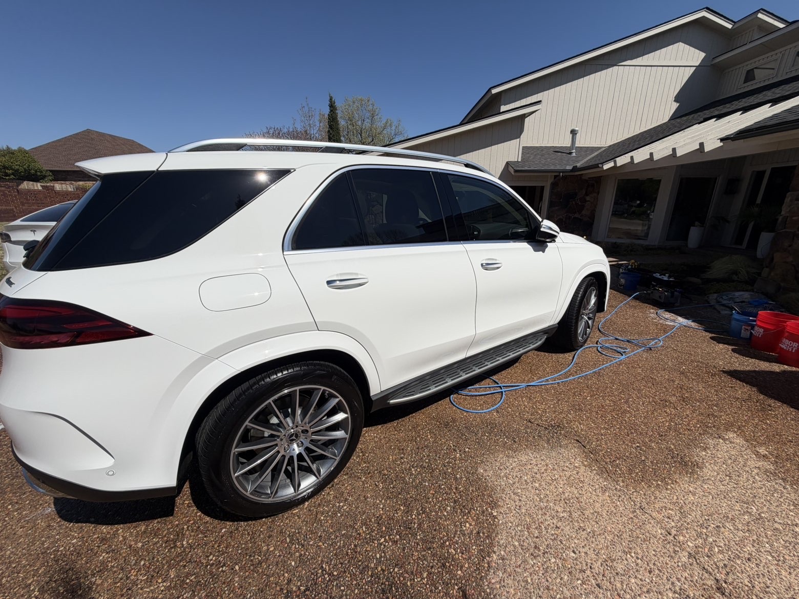 White Mercedes-Benz GLE 350 rear side view after detail