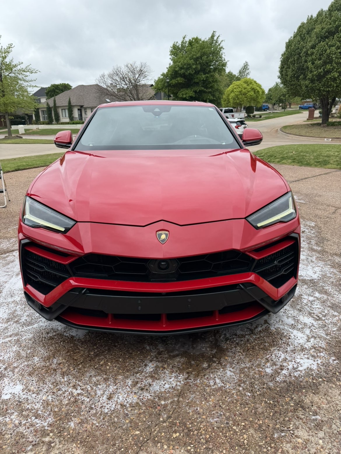 Red Lamborghini Urus front view freshly washed by JBG Auto Spa
