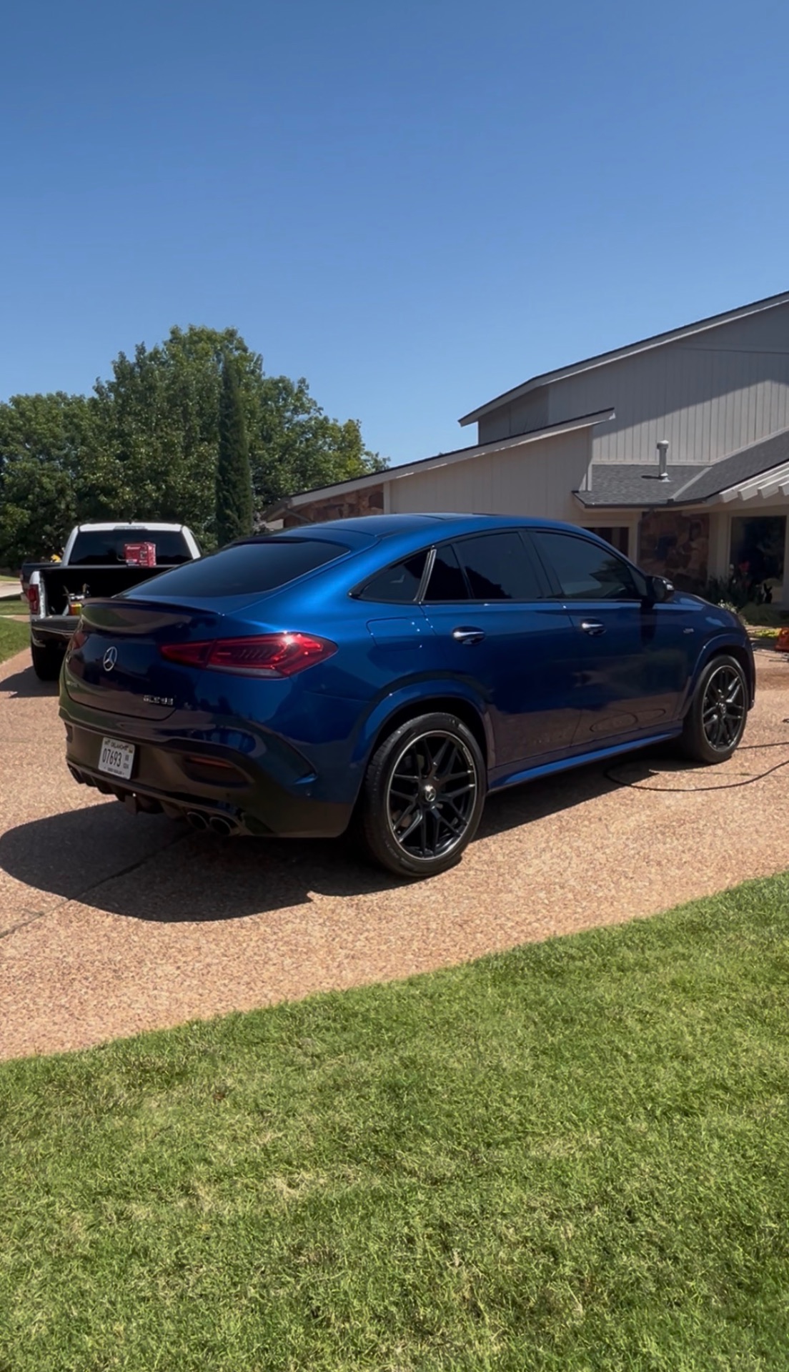 Blue Mercedes-AMG GLE Coupe rear side view after detail